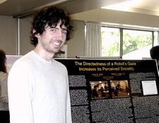 Photo of honors student presenting their project.
